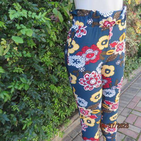 Navy stretch polyester skinny floral pants side pockets and elastic waist, size 34