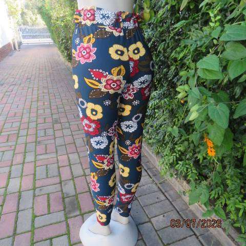 Navy stretch polyester skinny floral pants side pockets and elastic waist, size 34
