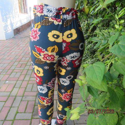 Navy stretch polyester skinny floral pants side pockets and elastic waist, size 34