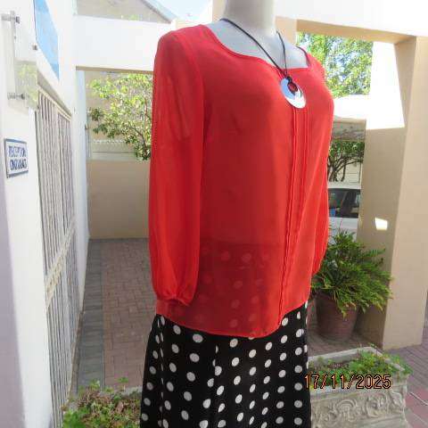 FASHION Express size 34 red sheer polyester slip over long sleeve top.