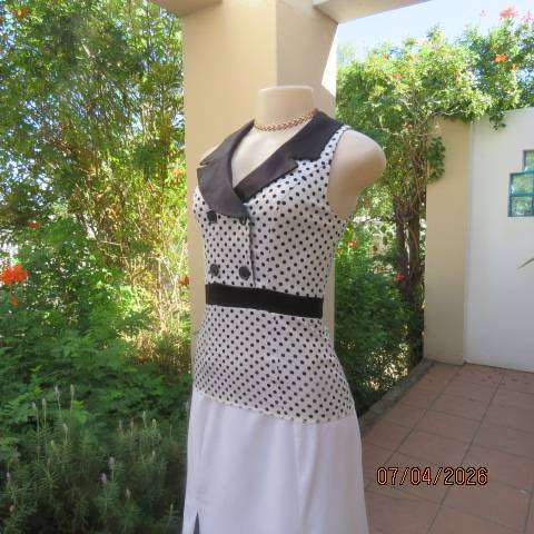 WWW white and black polkadot shiny polycotton stretch peplum top with long back zip, size 30