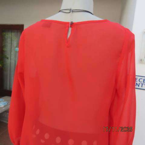 FASHION Express size 34 red sheer polyester slip over long sleeve top.