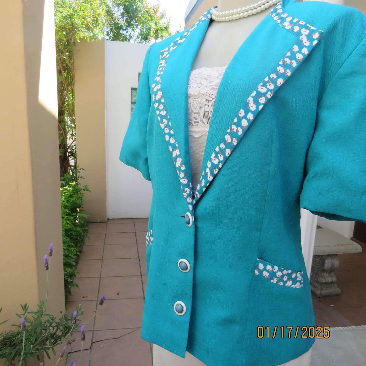LADY RUTH REED 80's vintage turquoise short sleeve jacket. With floral edging. Size 38. As new cond.