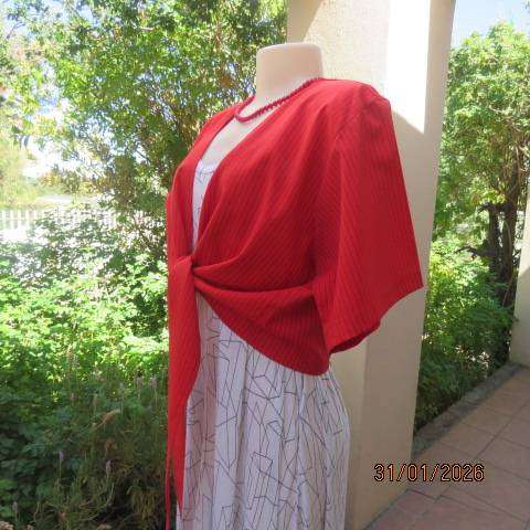 Owner made cherry red with thin vertical black stripes bolero with straps to tie. Size 44
