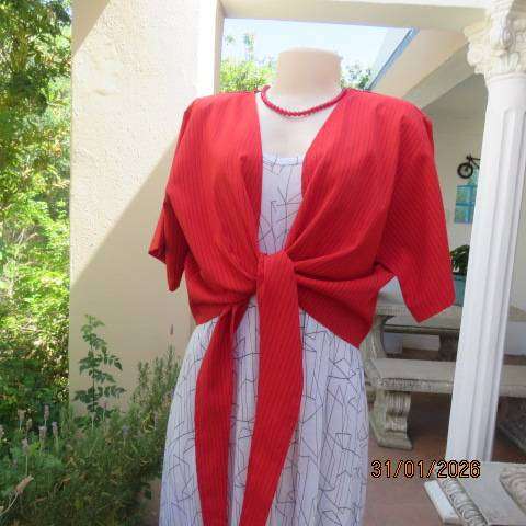 Owner made cherry red with thin vertical black stripes bolero with straps to tie. Size 44