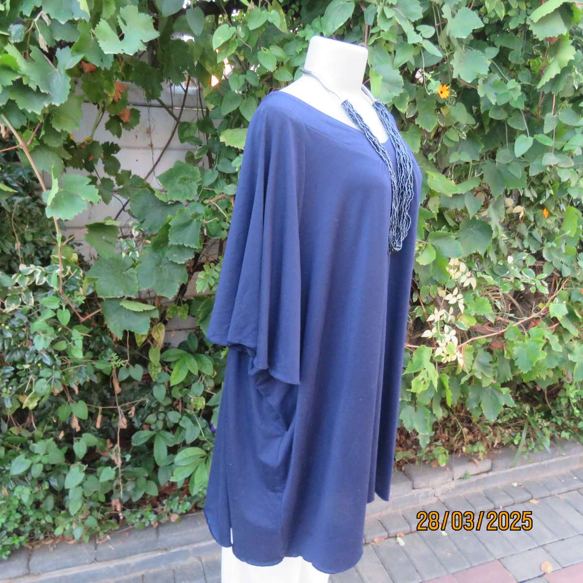 EAGLE navy slip over stretch polyester top with gathered front. Up to size 56