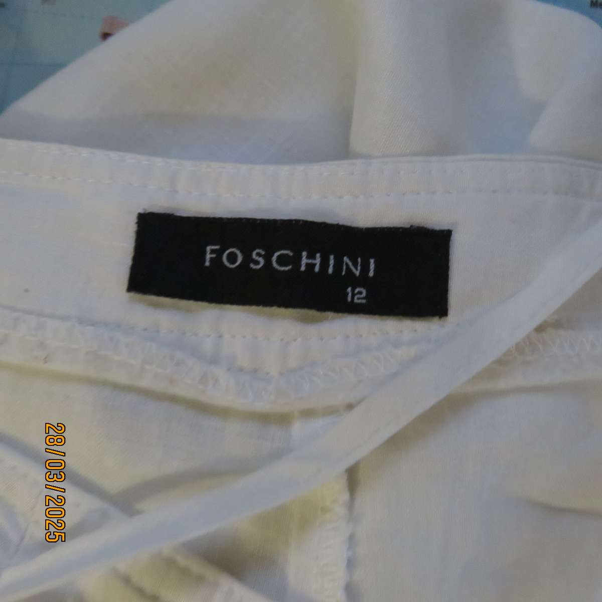 FOSHINI 100% linen white straight legged pants. Size 36. Front pockets