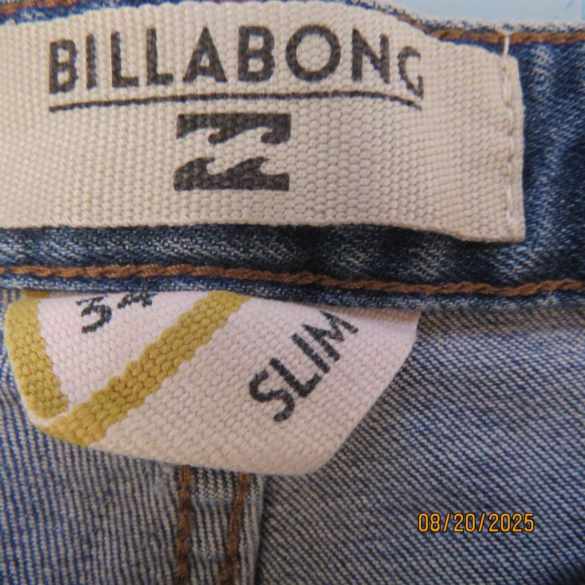 BILLABONG blue denim stretch polycotton jeans size 40 worn by lady.