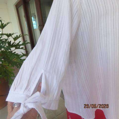 Miladys snow white slip-over cotton top with vertical embossed stripes, size 42