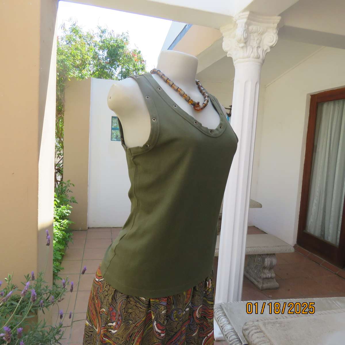 WOOLWORTHS olive green slip over cotton-lycra top.Size 38.Stud decoration. As new condition