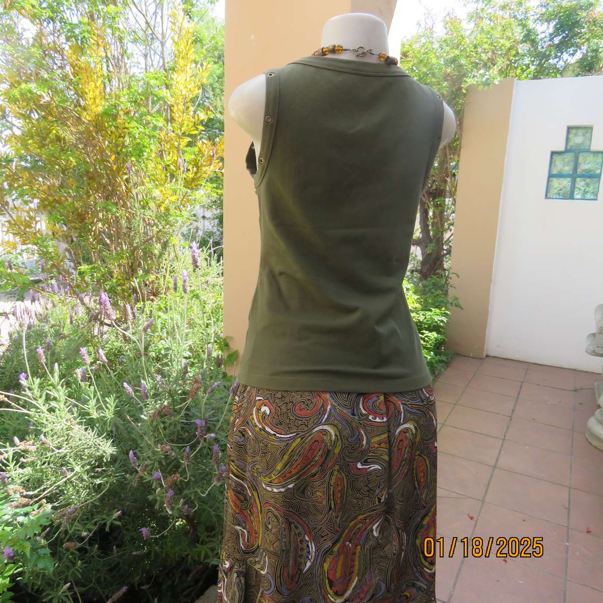 WOOLWORTHS olive green slip over cotton-lycra top.Size 38.Stud decoration. As new condition