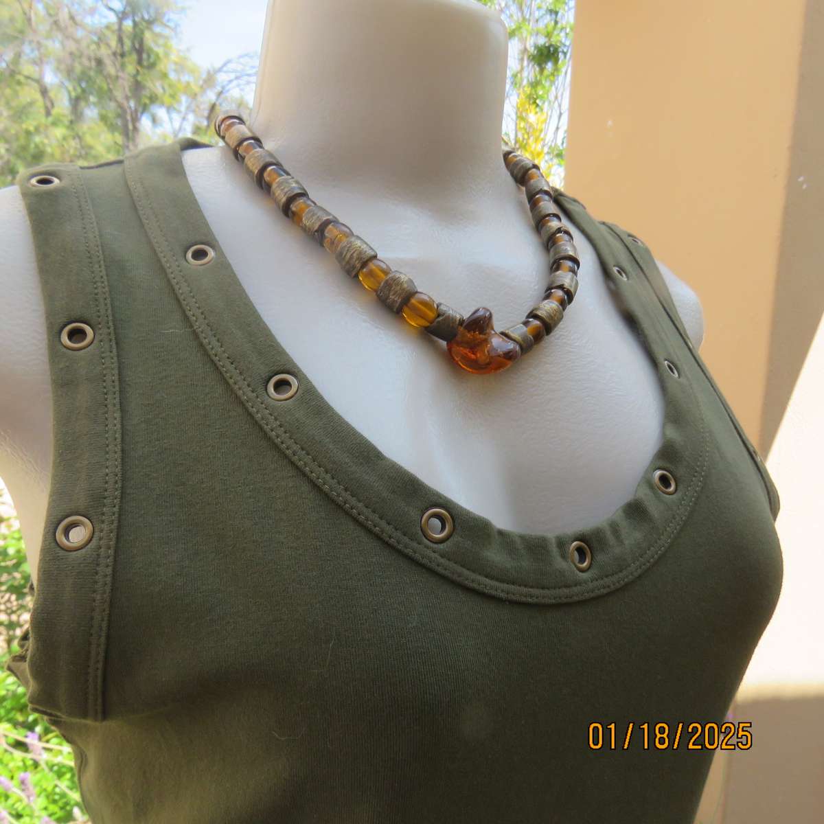 WOOLWORTHS olive green slip over cotton-lycra top.Size 38.Stud decoration. As new condition