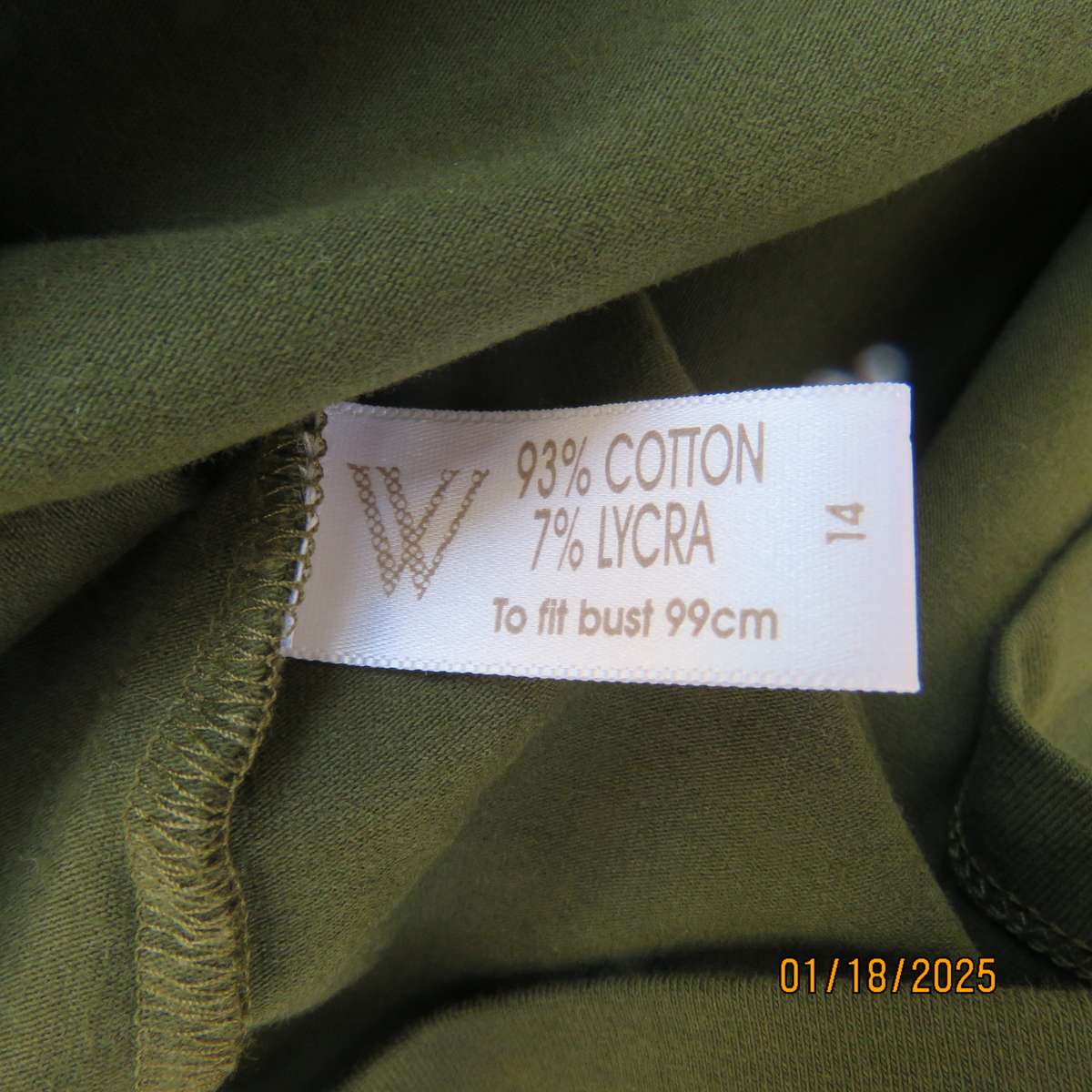 WOOLWORTHS olive green slip over cotton-lycra top.Size 38.Stud decoration. As new condition