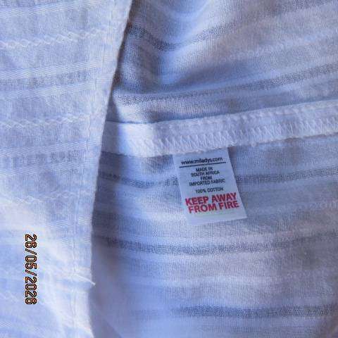 Miladys snow white slip-over cotton top with vertical embossed stripes, size 42