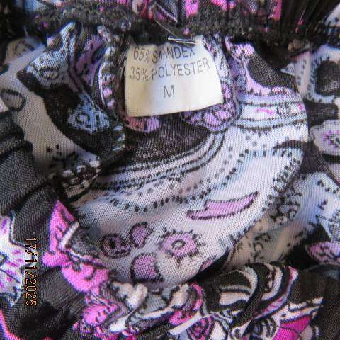 Soft stretch polyester black rounded paneled skirt with pink-white bo-ho print. Size 35