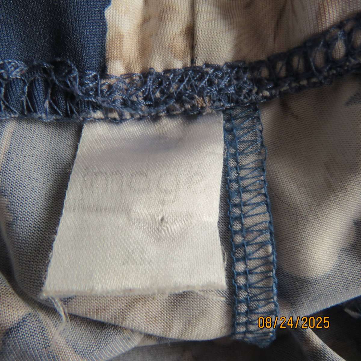 Navy stretch polyester stretch pants with white-beige flowers. Size 40