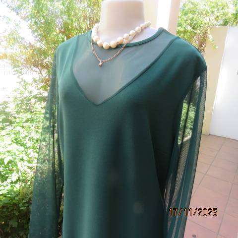 Hunters green long stretch polyester with sheer V inlay and sleeves. Size 42