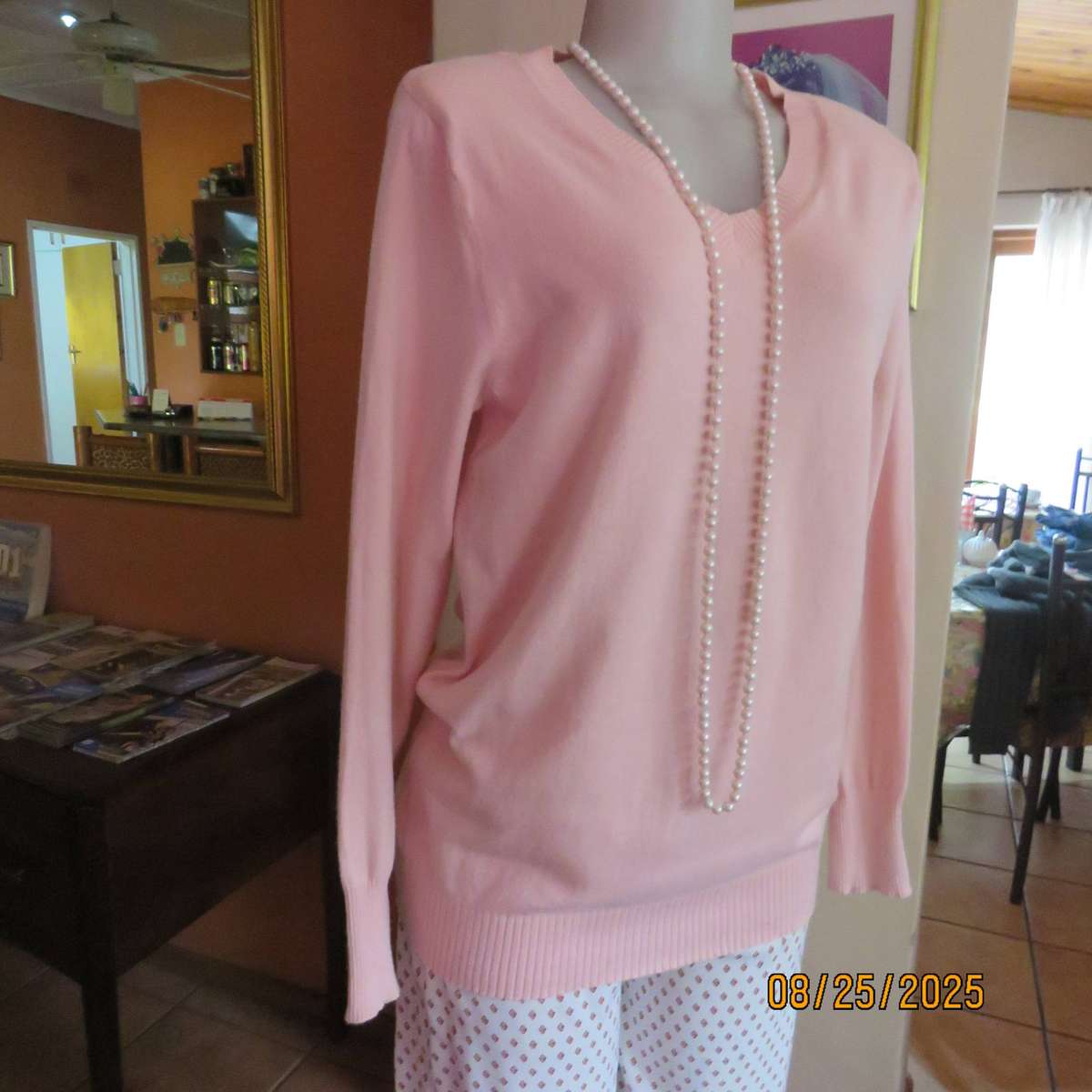 Soft peach pink pull over long sleeve V neck polyester-viscose-nylon cardigan. Size 38