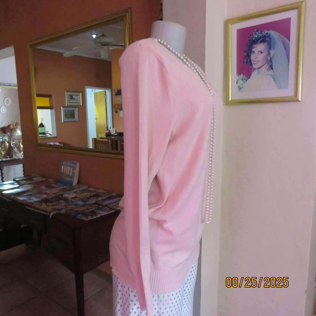 Soft peach pink pull over long sleeve V neck polyester-viscose-nylon cardigan. Size 38