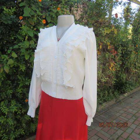 M M elegant off white long polyester puffed sleeve top with acrylic knit body and frills, size 36