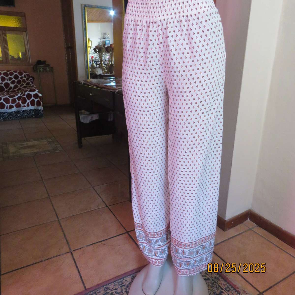 REAL Woman viscose wide legged cream pants with diamond pattern and border. Size 34