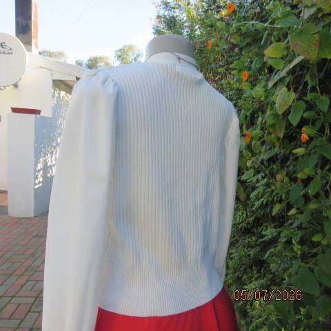 M M elegant off white long polyester puffed sleeve top with acrylic knit body and frills, size 36