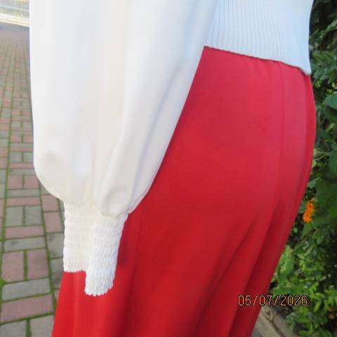 M M elegant off white long polyester puffed sleeve top with acrylic knit body and frills, size 36