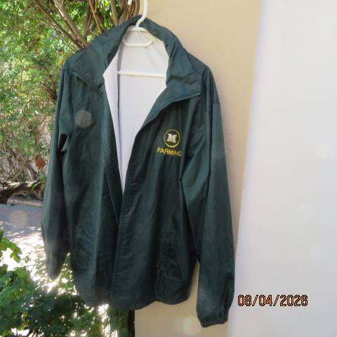 Mr Farming green nylon waterproof jacket with breathable lining and hood, size XL