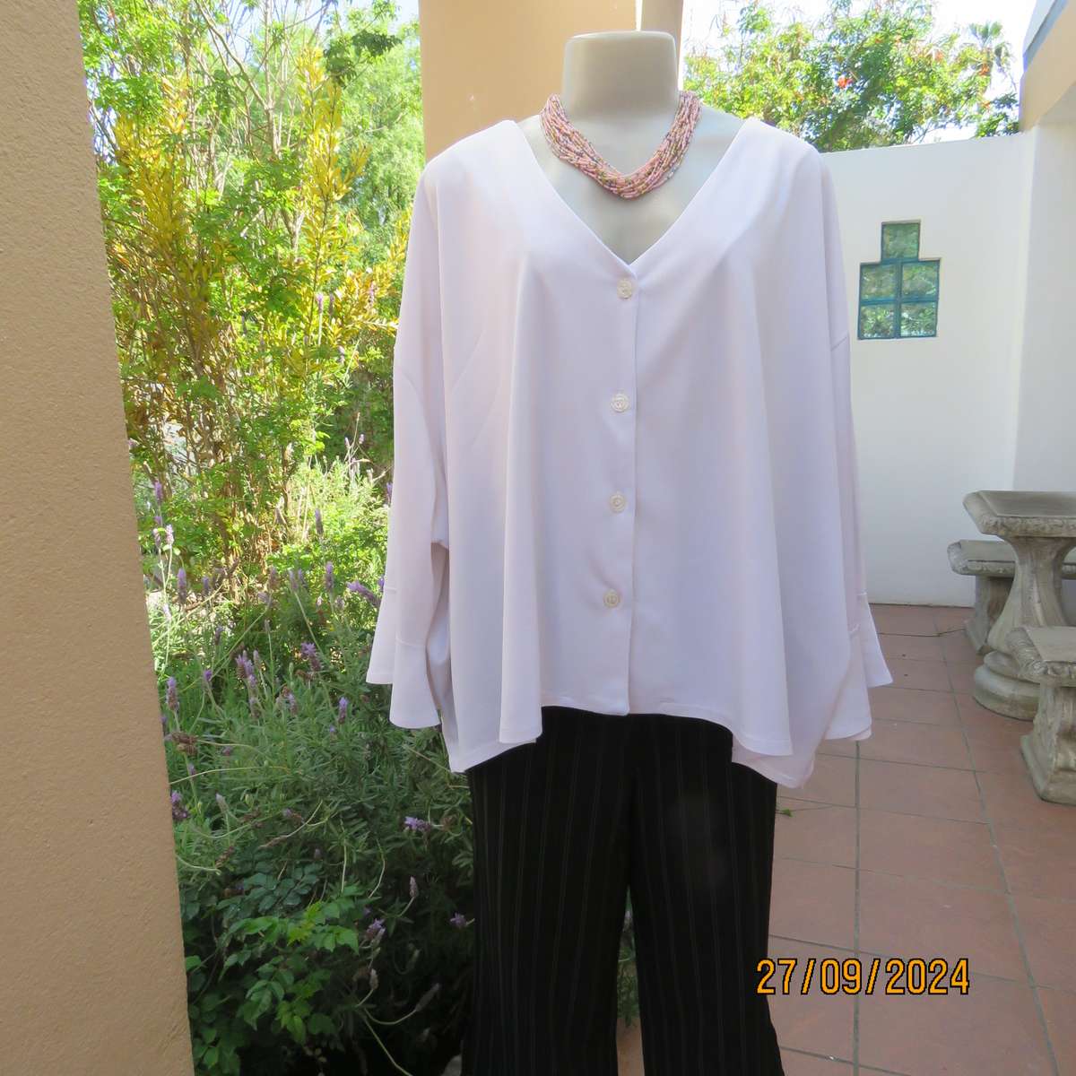 Owner made stretch textured polyester button down V neck top,. Size 58