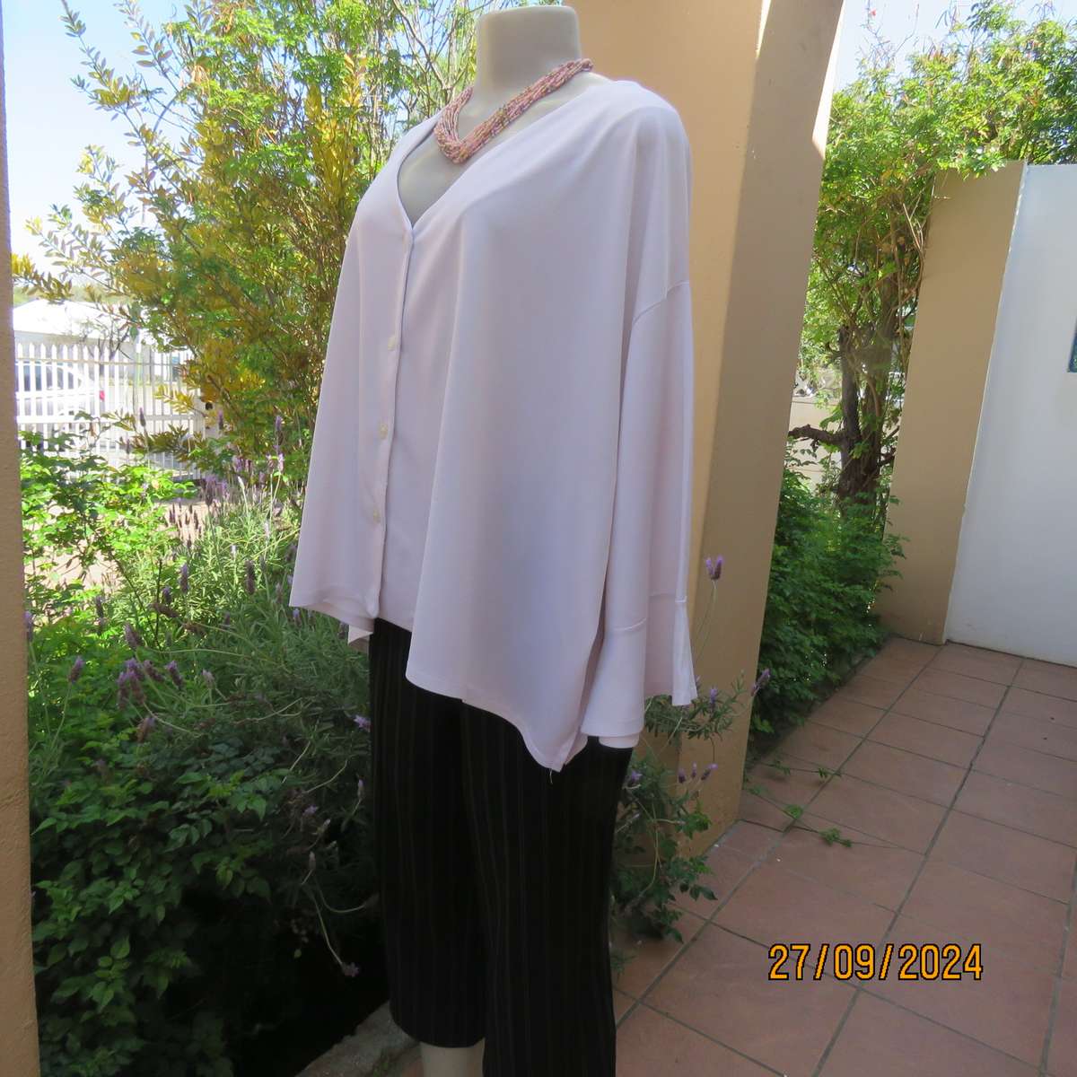 Owner made stretch textured polyester button down V neck top,. Size 58