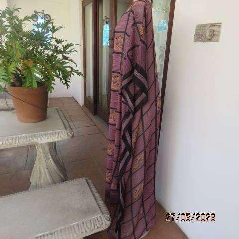 Maxi slip-over dress in large block pattern mulberry pink polyester with black. Free size