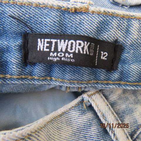 High rise mom light blue distressed look denim jeans in size 36