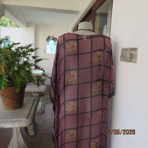 Maxi slip-over dress in large block pattern mulberry pink polyester with black. Free size