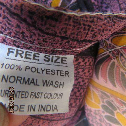 Maxi slip-over dress in large block pattern mulberry pink polyester with black. Free size