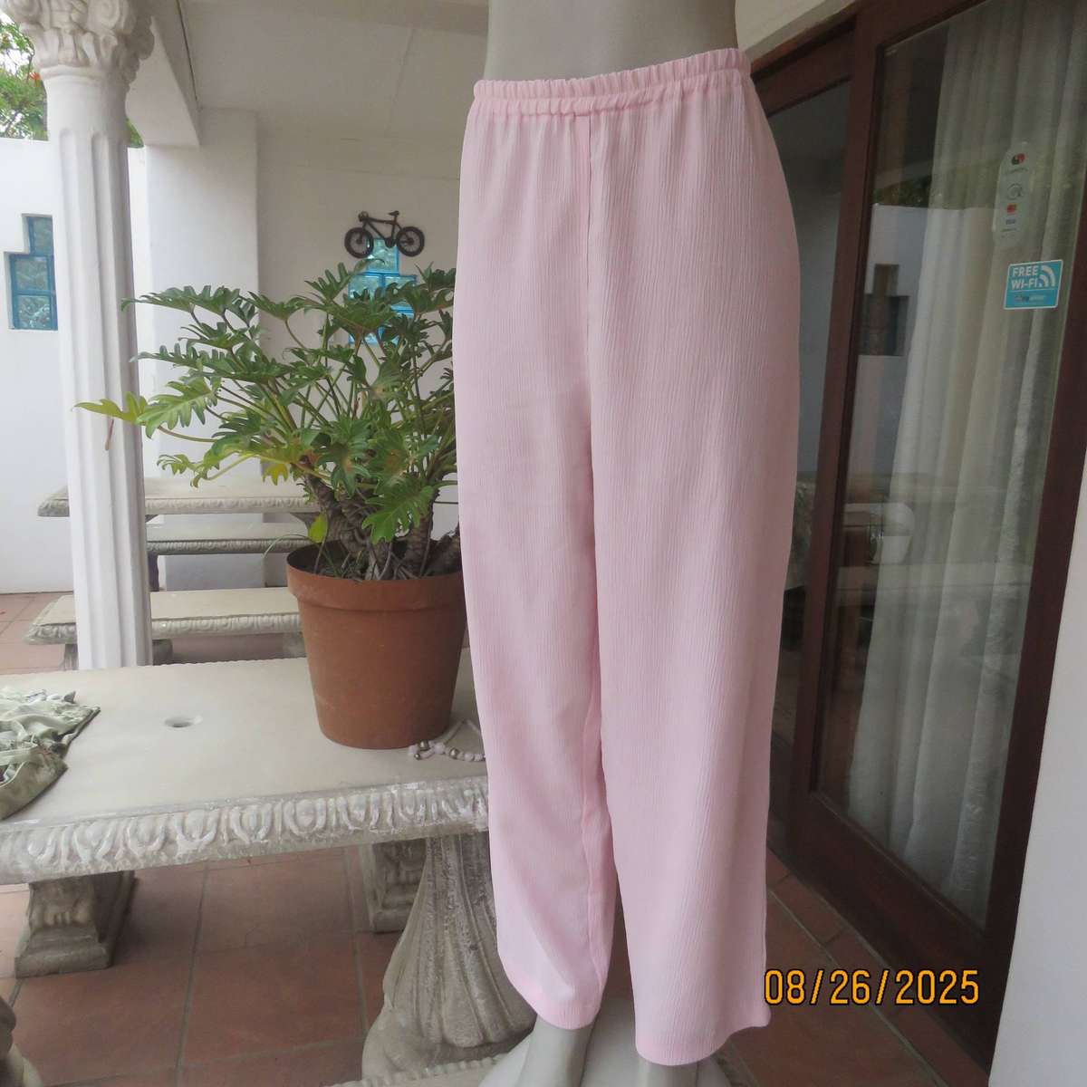 B LINE sorbet pink vertical crinkled polyester pants with elasticated waist. Size 40
