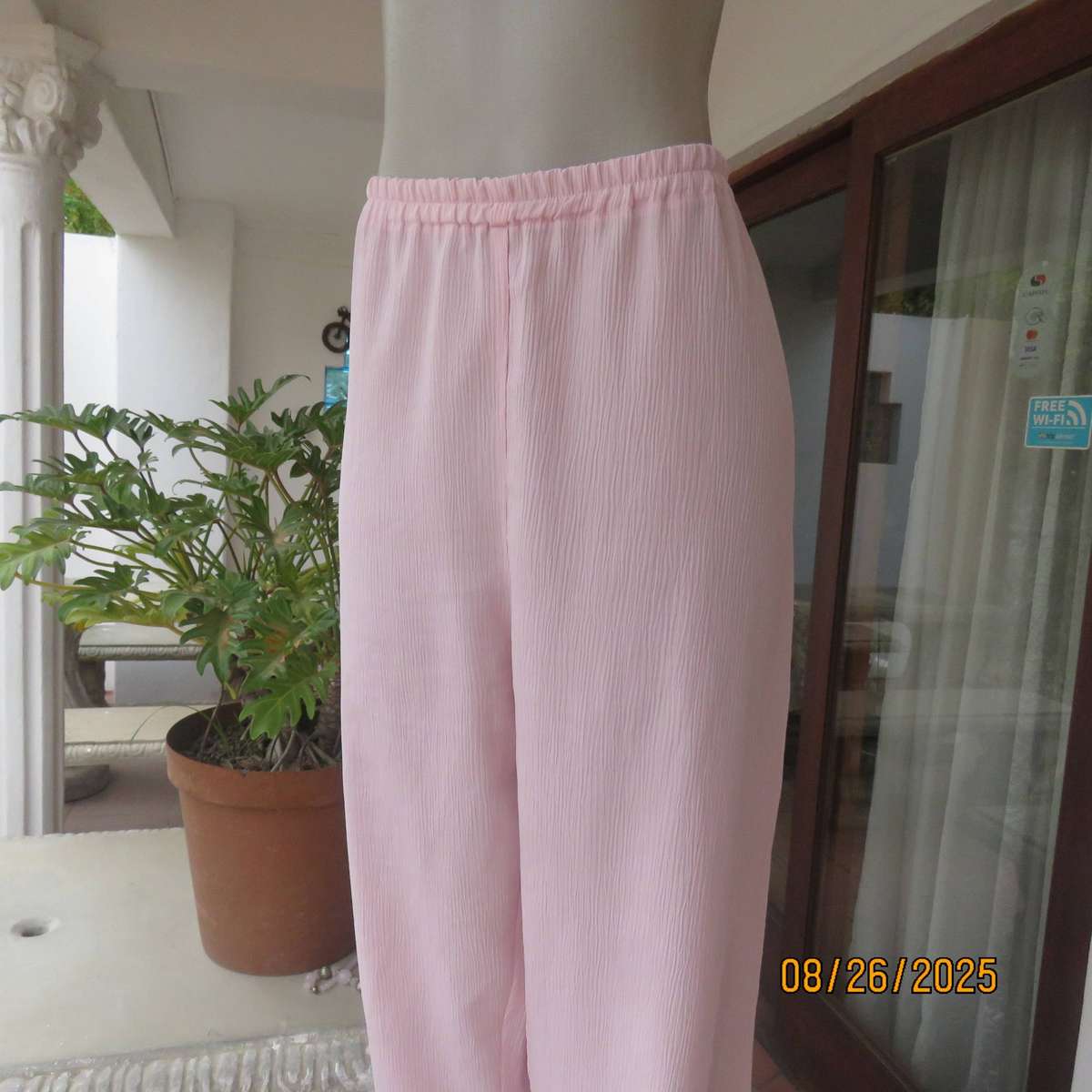 B LINE sorbet pink vertical crinkled polyester pants with elasticated waist. Size 40