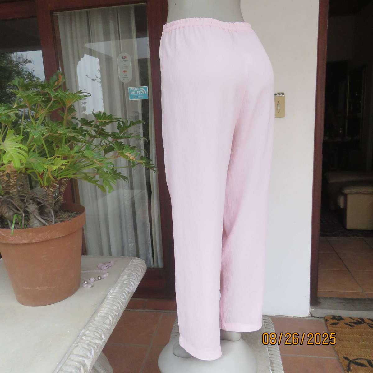B LINE sorbet pink vertical crinkled polyester pants with elasticated waist. Size 40