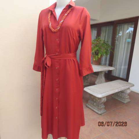 Rust colour button-down long sleeve polyester dress with open collar and fabric belt, size 34