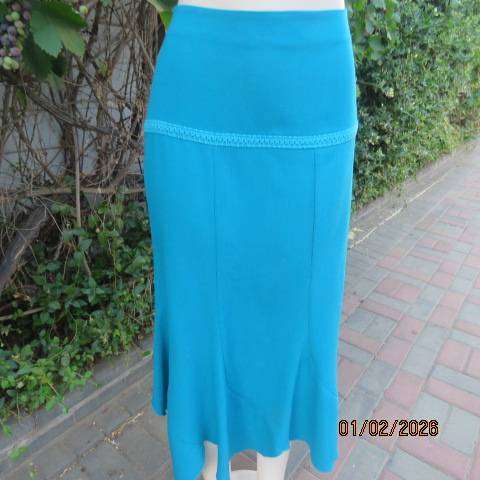 RENE TAYLOR jade skirt with asymmetrical seamline. Wide yoked front with panels. Size 42.