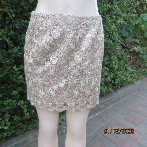 Ecru colour bridal satin boutique made mini skirt with thick polyester lace overlay. Size 36