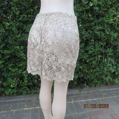 Ecru colour bridal satin boutique made mini skirt with thick polyester lace overlay. Size 36