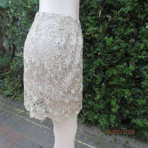 Ecru colour bridal satin boutique made mini skirt with thick polyester lace overlay. Size 36