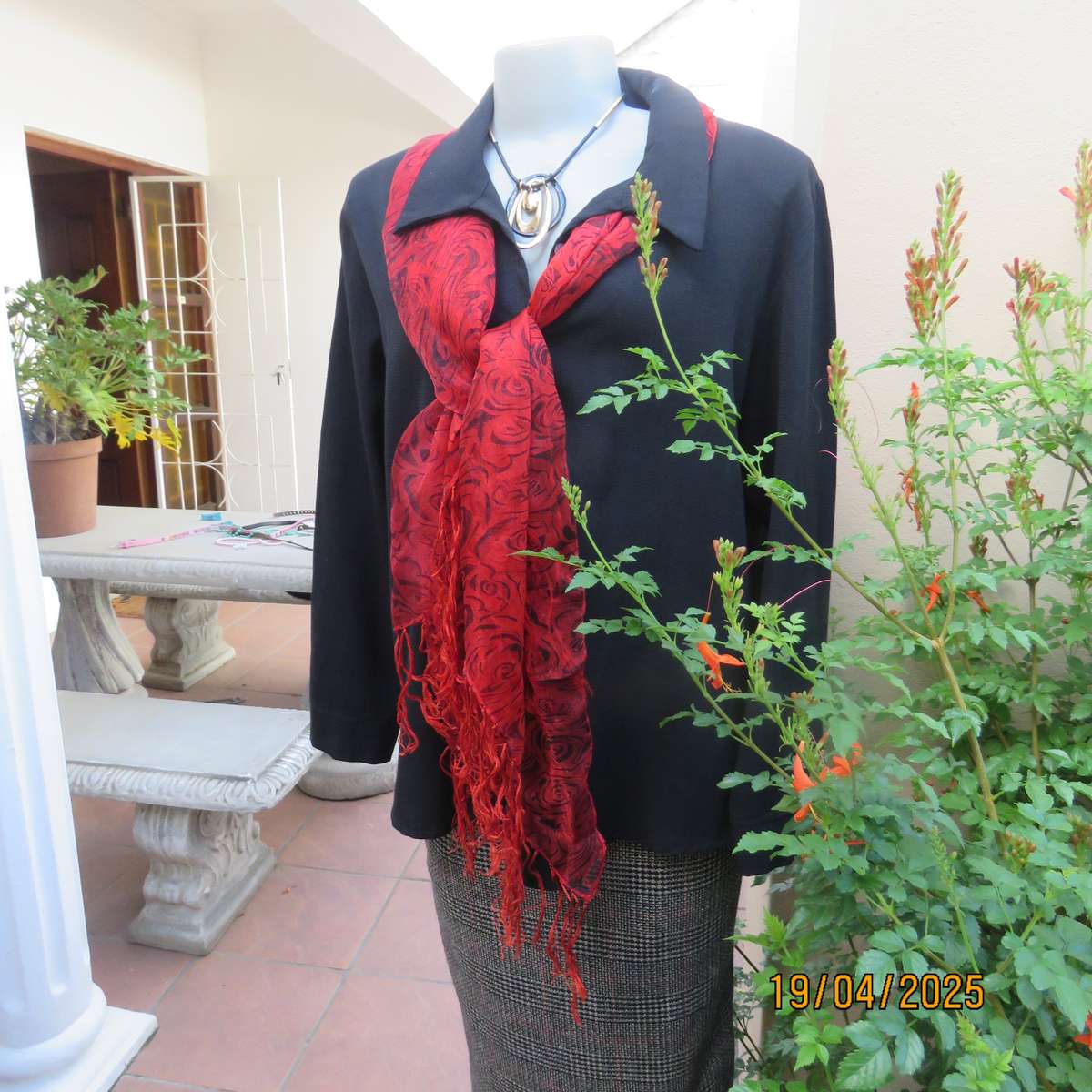 Black long sleeve textured polyester button down top size 42.