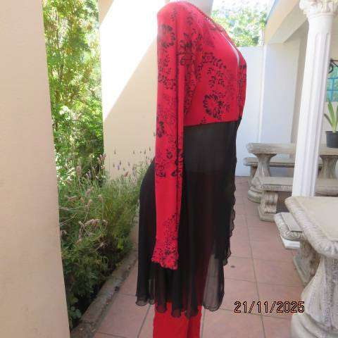 Red long sleeve with black floral print with long sheer black bottom. Size 42-44