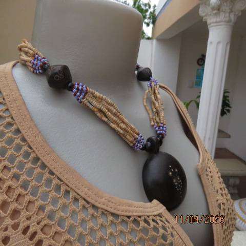 Ethnic style wooden and bead choker with blue-red accents