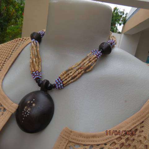 Ethnic style wooden and bead choker with blue-red accents