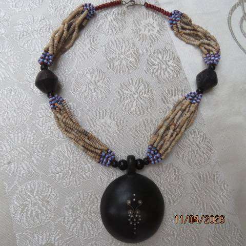 Ethnic style wooden and bead choker with blue-red accents