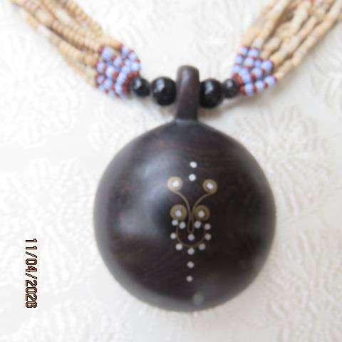 Ethnic style wooden and bead choker with blue-red accents