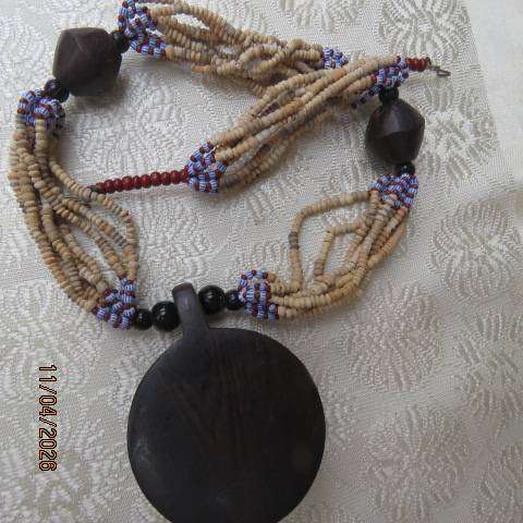 Ethnic style wooden and bead choker with blue-red accents