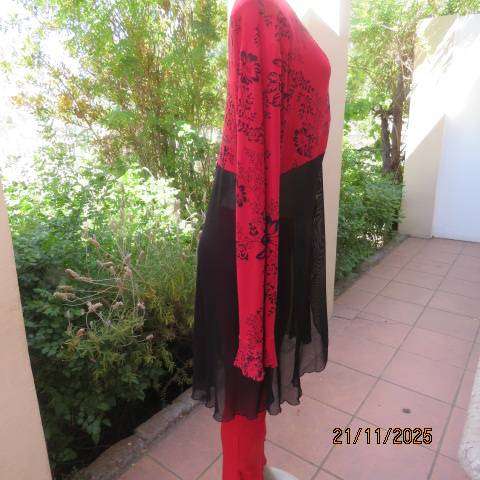 Red long sleeve with black floral print with long sheer black bottom. Size 42-44
